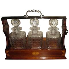 19th Century Georgian Inlaid Mahogany Tantalus with Three Decanters