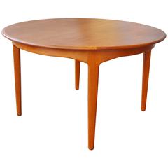 Danish Teak Round Four-Leaf Dining Table by Henning Kjaernulf / Soro Stolefabrik