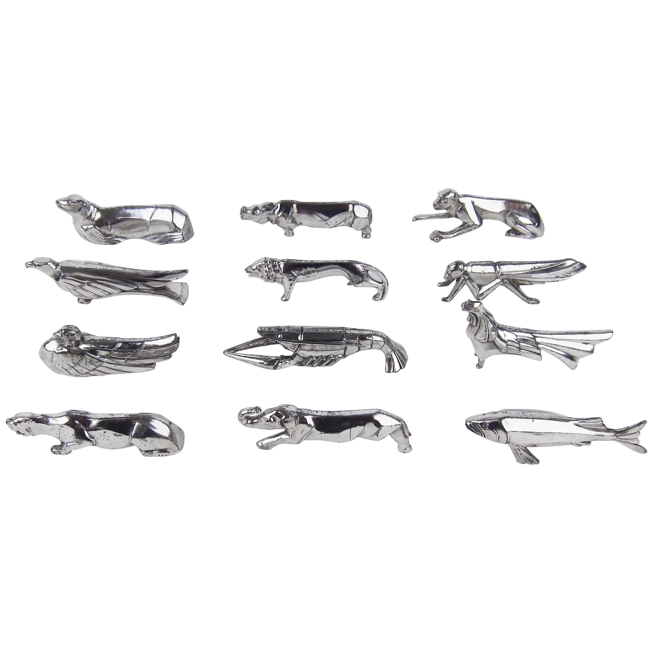 A complete set of 12 Art Deco animal knife rests in their original fitted case. The chromium plated cast metal animals are likely of European origin, circa 1920s, similar to the animals designed by Edouard Marcel Sandoz for Christofle Gallia. 

The