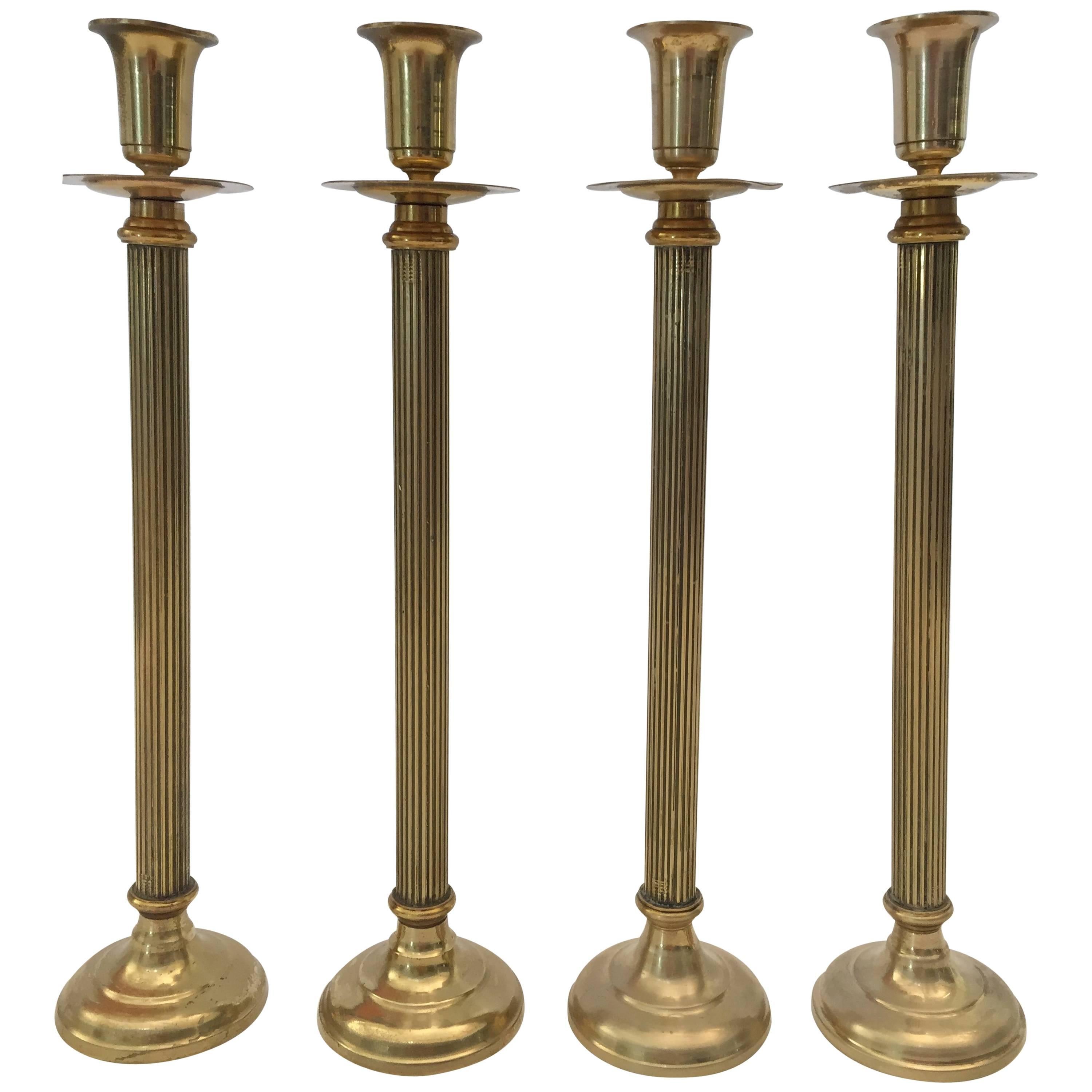 Set of Four Victorian Brass Candlesticks