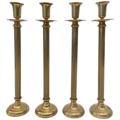 Set of Four Victorian Brass Candlesticks