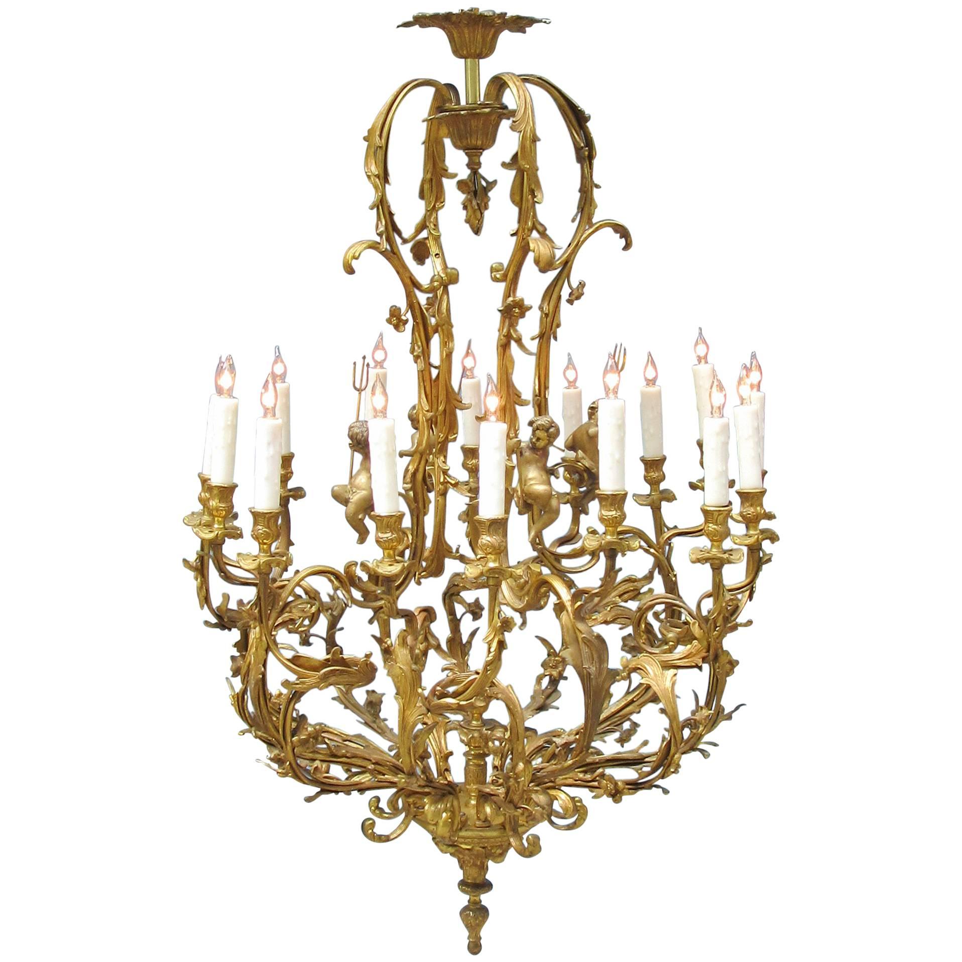 Early 20th Century French Louis XIV Bronze Doré Foliate and Putti Chandelier