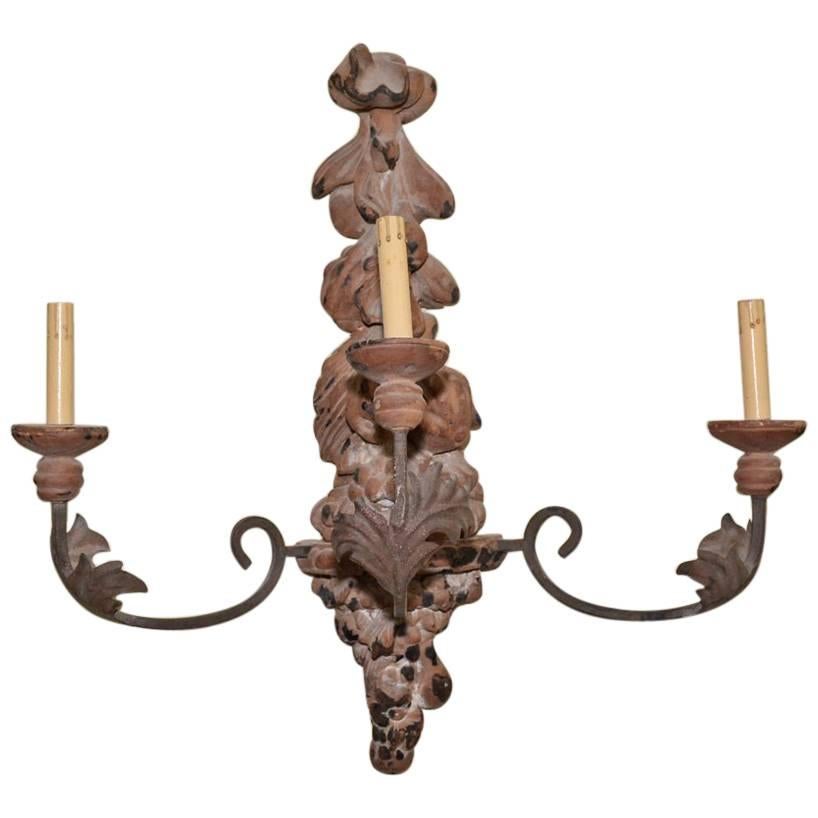 Italian Hand-Carved Wood and Iron Sconce For Sale