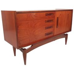 Small Mid-Century Modern Credenza with a Sculpted Base 4