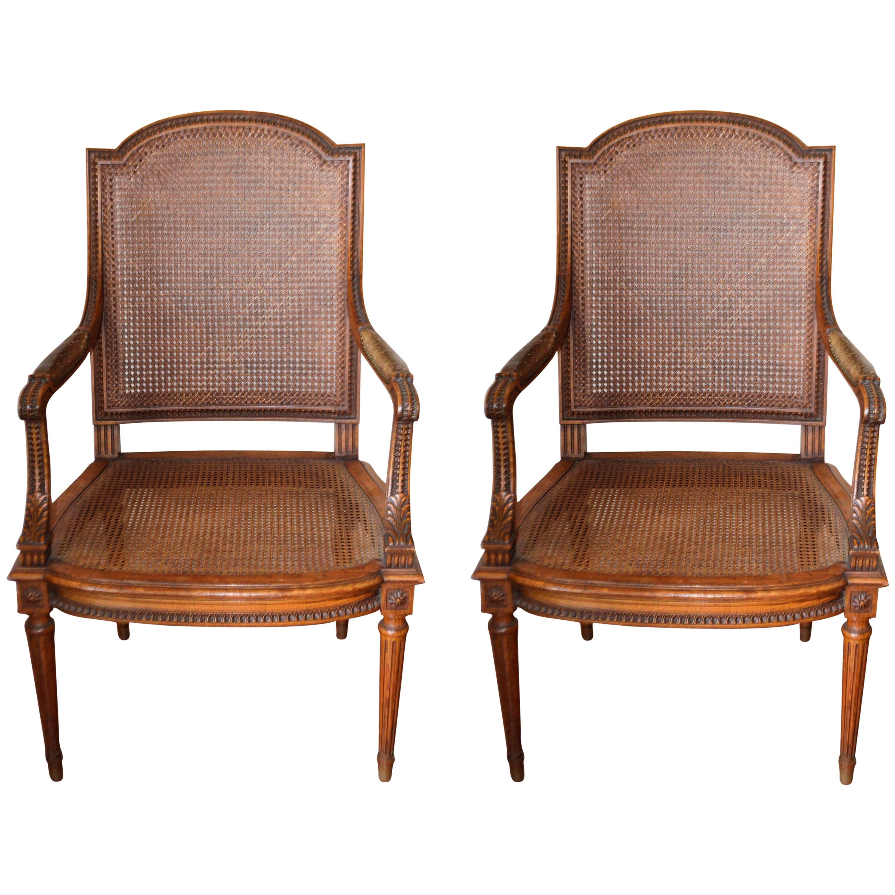 Pair of Louis XVI Style Hand-Caned and Carved Mahogany Armchairs with Leather