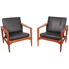 Mid-Century Modern Teak and Leather Lounge Chairs by Illum Wikkelsø 9