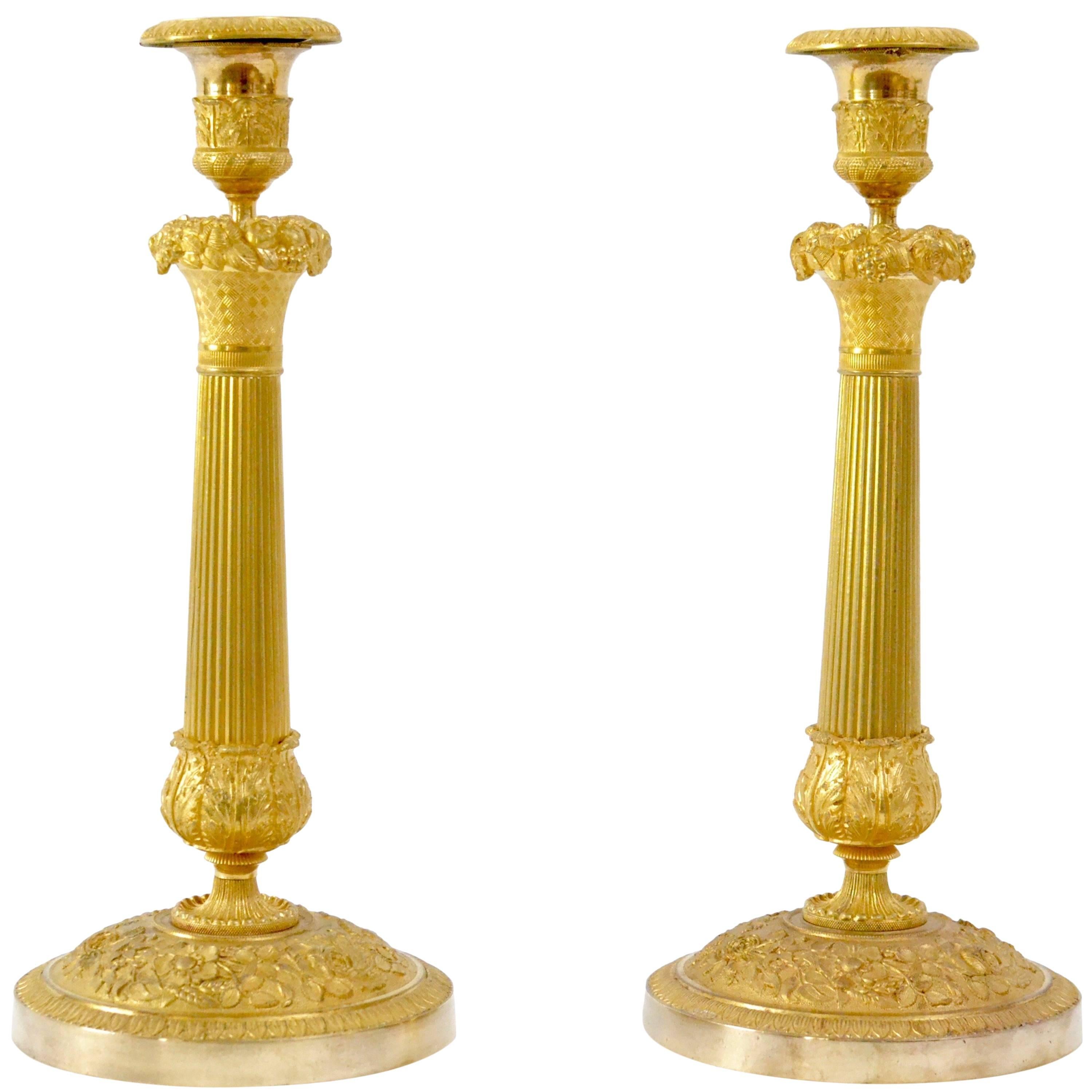 Pair of Gilt Bronze Empire Candlesticks