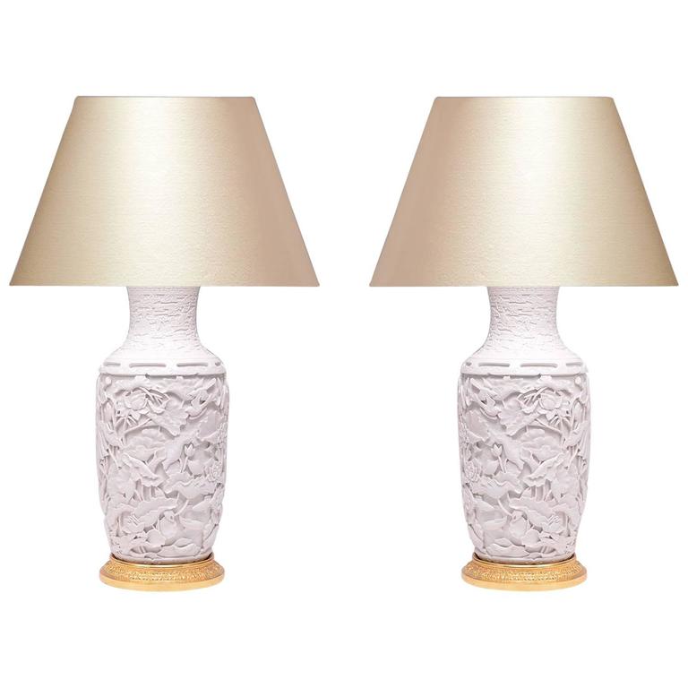 Pair Of Fine Carved White Porcelain Lamps For At 1stdibs Pair Of Fine Carved White Porcelain Lamps