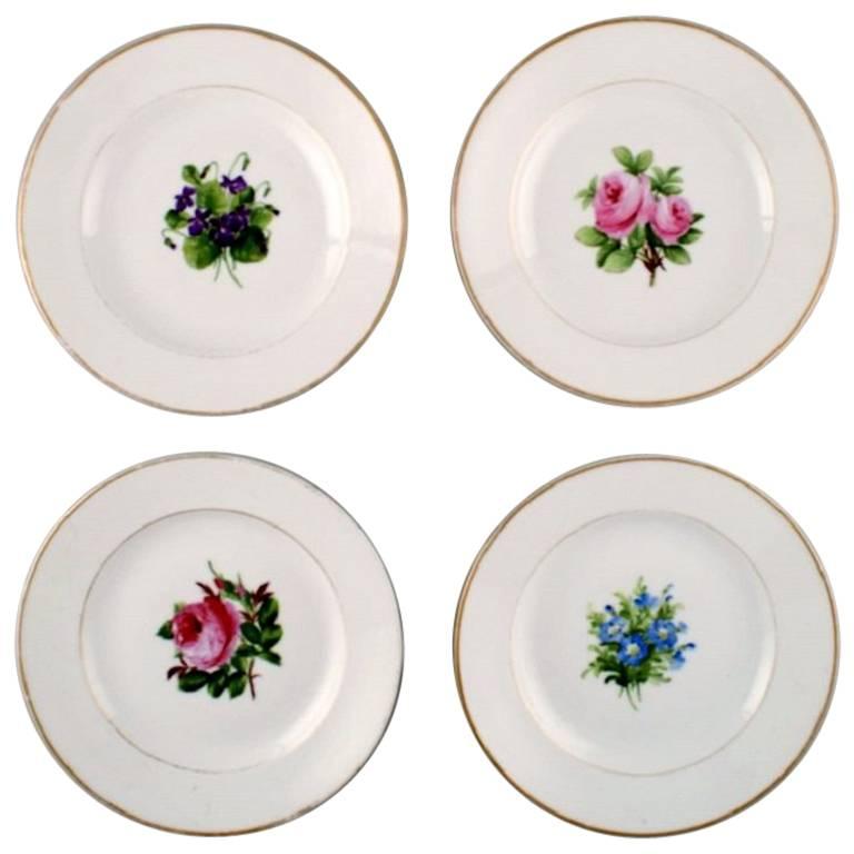 Four Antique Royal Copenhagen Flat Plates in Flora Danica Style For Sale