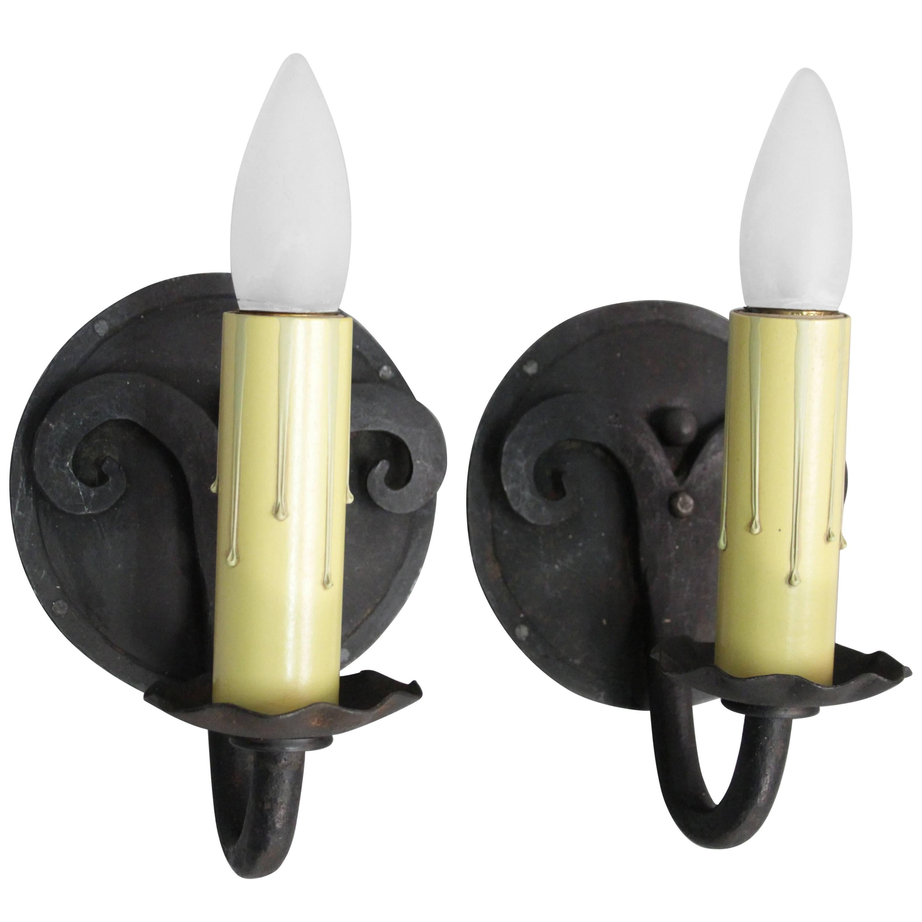 Pair of Single Wrought Iron Spanish Sconces with Round Backplate