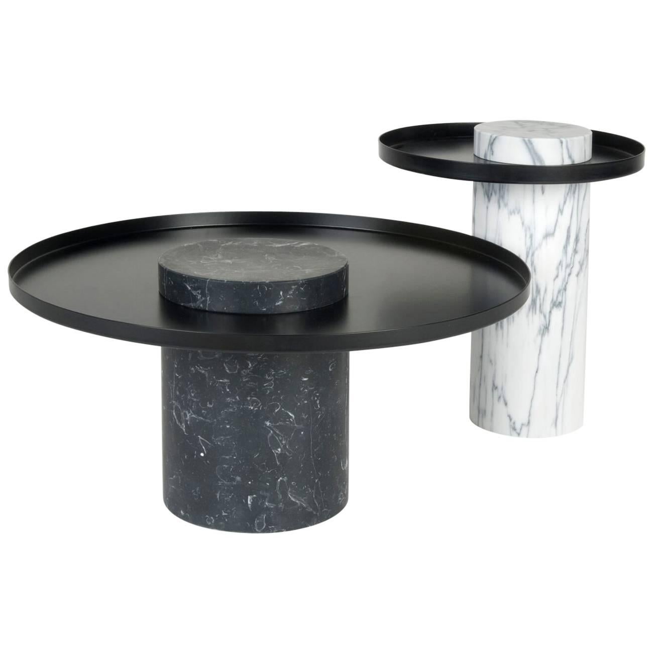 Salute is a family of tables.
Each element can be used alone (coffee table, occasional table) or combined together to play with different heights and formats as well as combinations of materials. The strong presence of the marble column is lightened