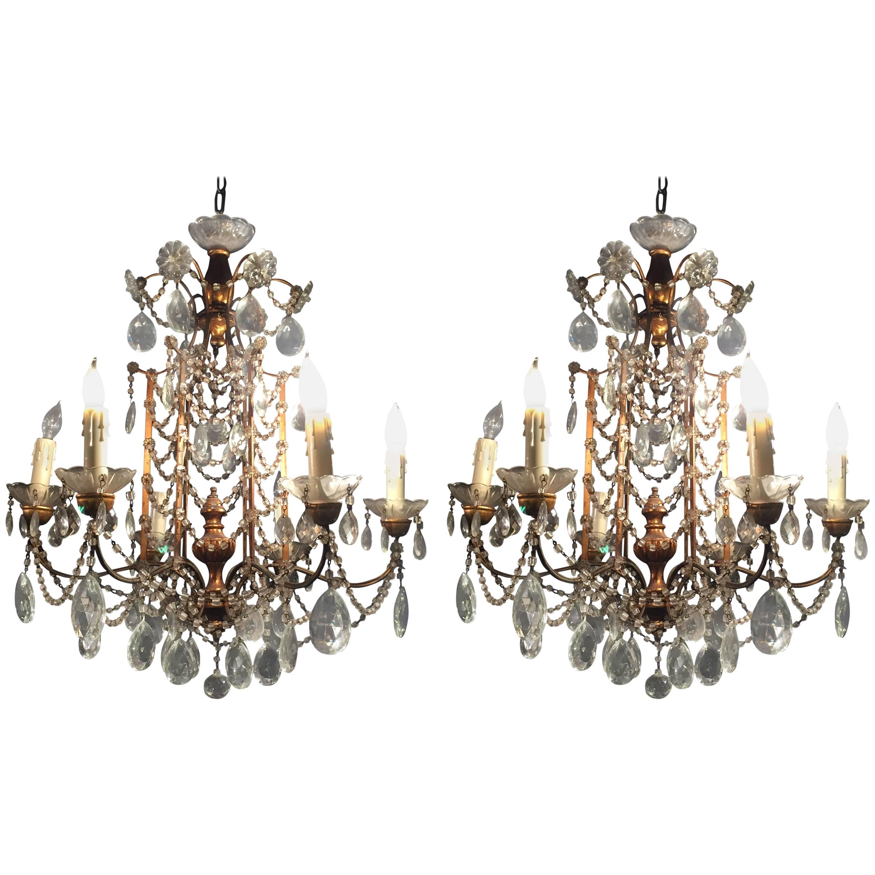 Pair of 1920s Crystal and Gilded Wood Italian Chandeliers
