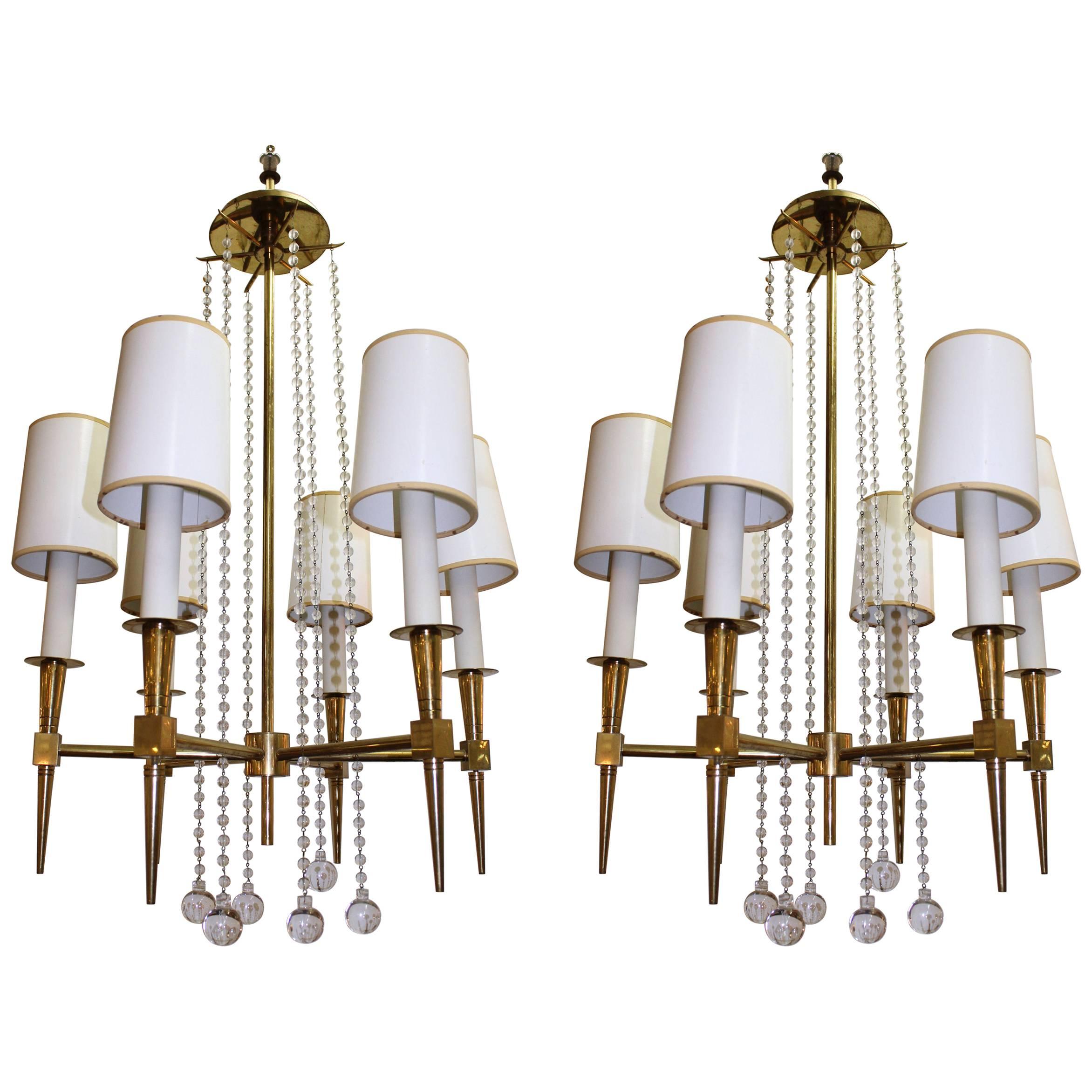 Pair of Tommi Parzinger Chandeliers with Six Lights