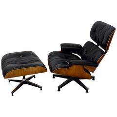 Early Production Charles and Ray Eames Rosewood Lounge Chair with Ottoman