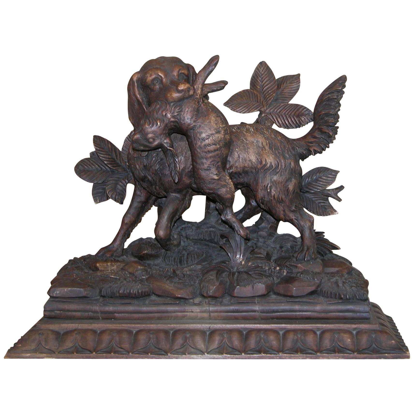 Black Forest Carving of Hunting Dog with Rabbit on Fancy Carved Base, circa 1850