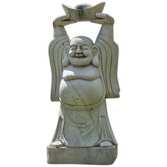 Sculpture de jardin chinoise représentant un Bouddha accueillant et heureux