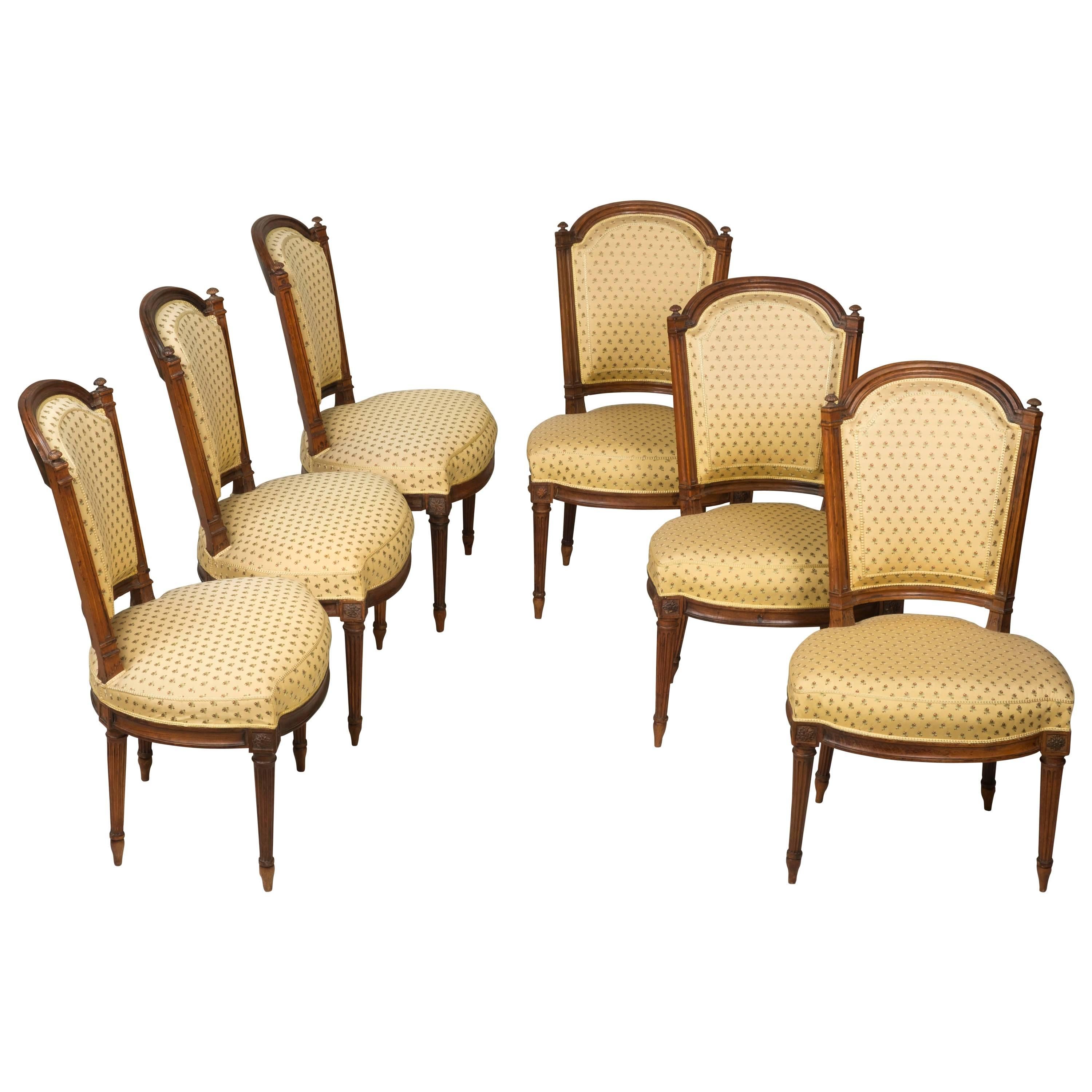 Set of Six Louis XVI Walnut Chairs For Sale