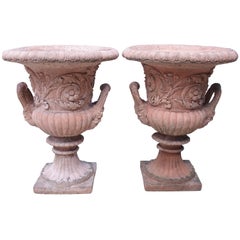 Pair of French Terra Cotta Colored Cast Stone Medici Urns