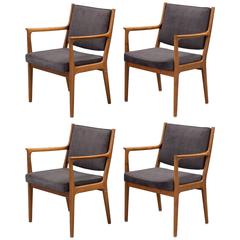 Set of Four Midcentury Armchairs in Walnut by Karl Erik Ekselius
