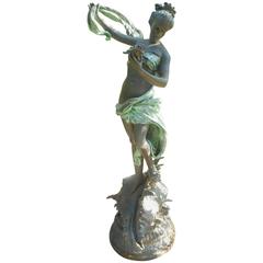 Fontaine d'eau en bronze représentant une femme sur une grande coquille