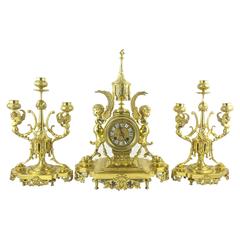 19th Century French Solid Gilt Brass Three-Piece Mantle Clock Garniture Set
