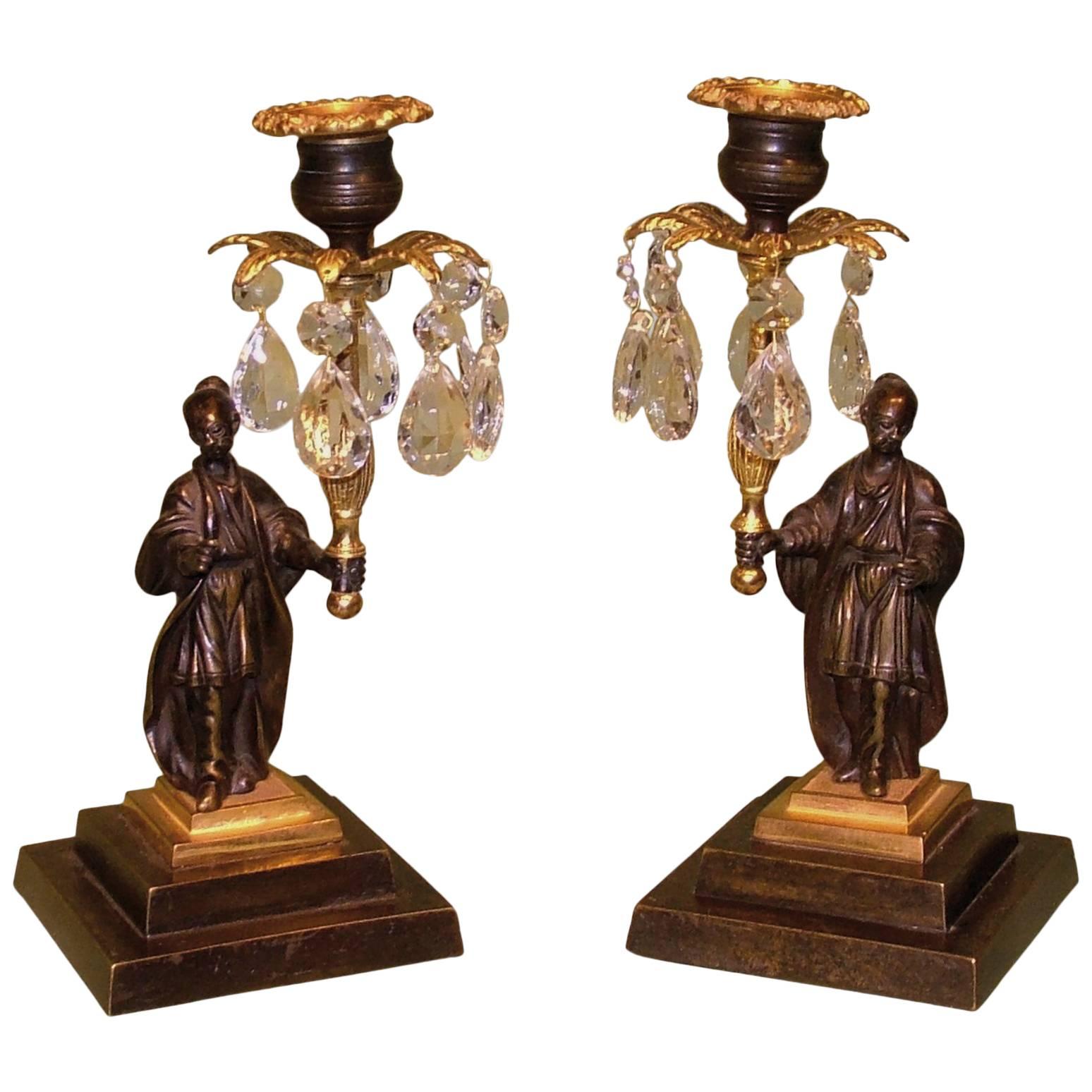 19th Century chinamen bronze and ormolu lustre candlesticks