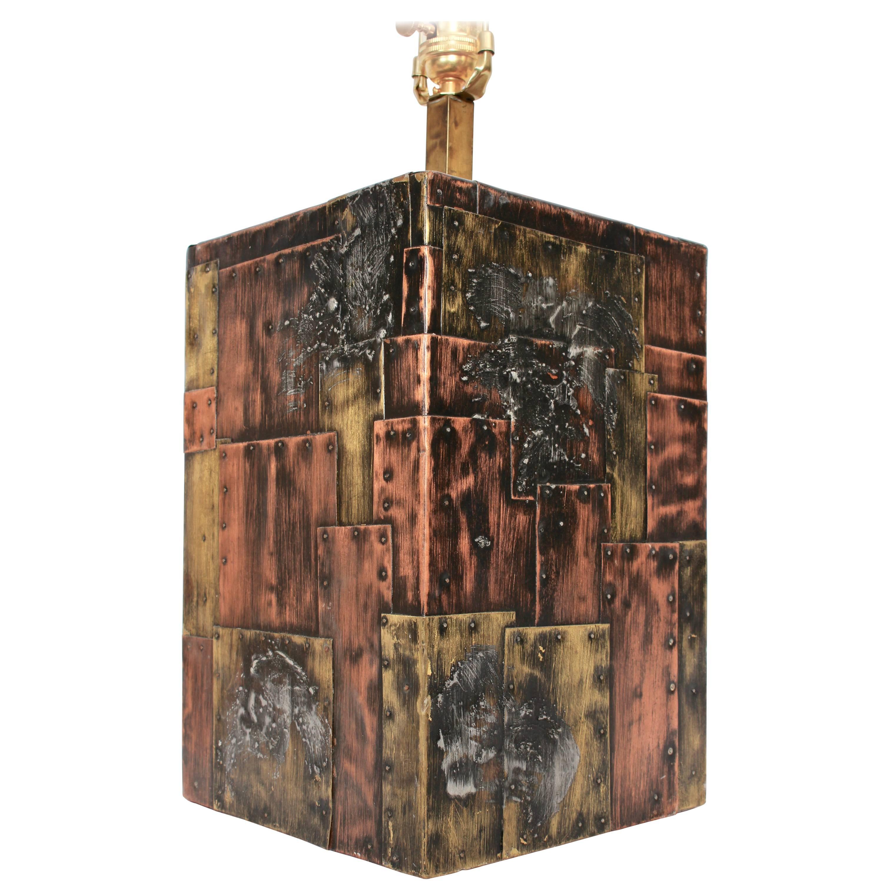 Paul Evans Studio Handcrafted CBP Patchwork Table Lamp in Copper, Brass and Pewter. Late 1960's. Featuring Colorful Copper and Brass Patchwork with Pewter splash and round nails as seen in early Studio pieces.  18 H to top socket. Lamp form 12 H.