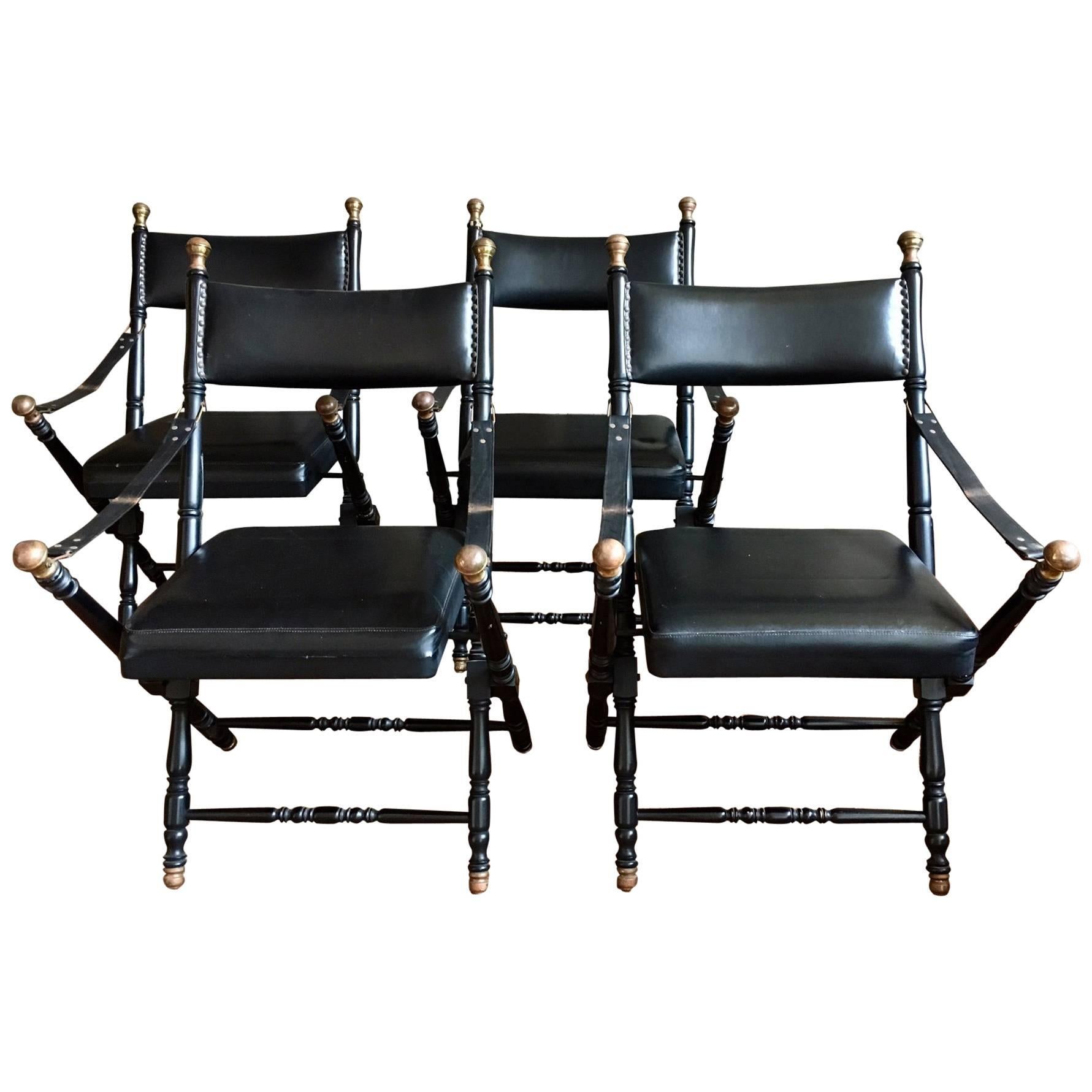 Two Black Leather Campaign Chairs in the Style of Maison Jansen