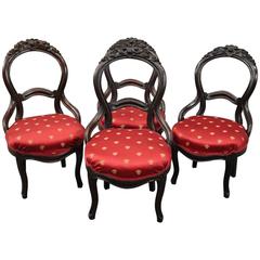 Four Antique Carved Walnut Balloon Back Upholstered Parlor Chairs, circa 1880