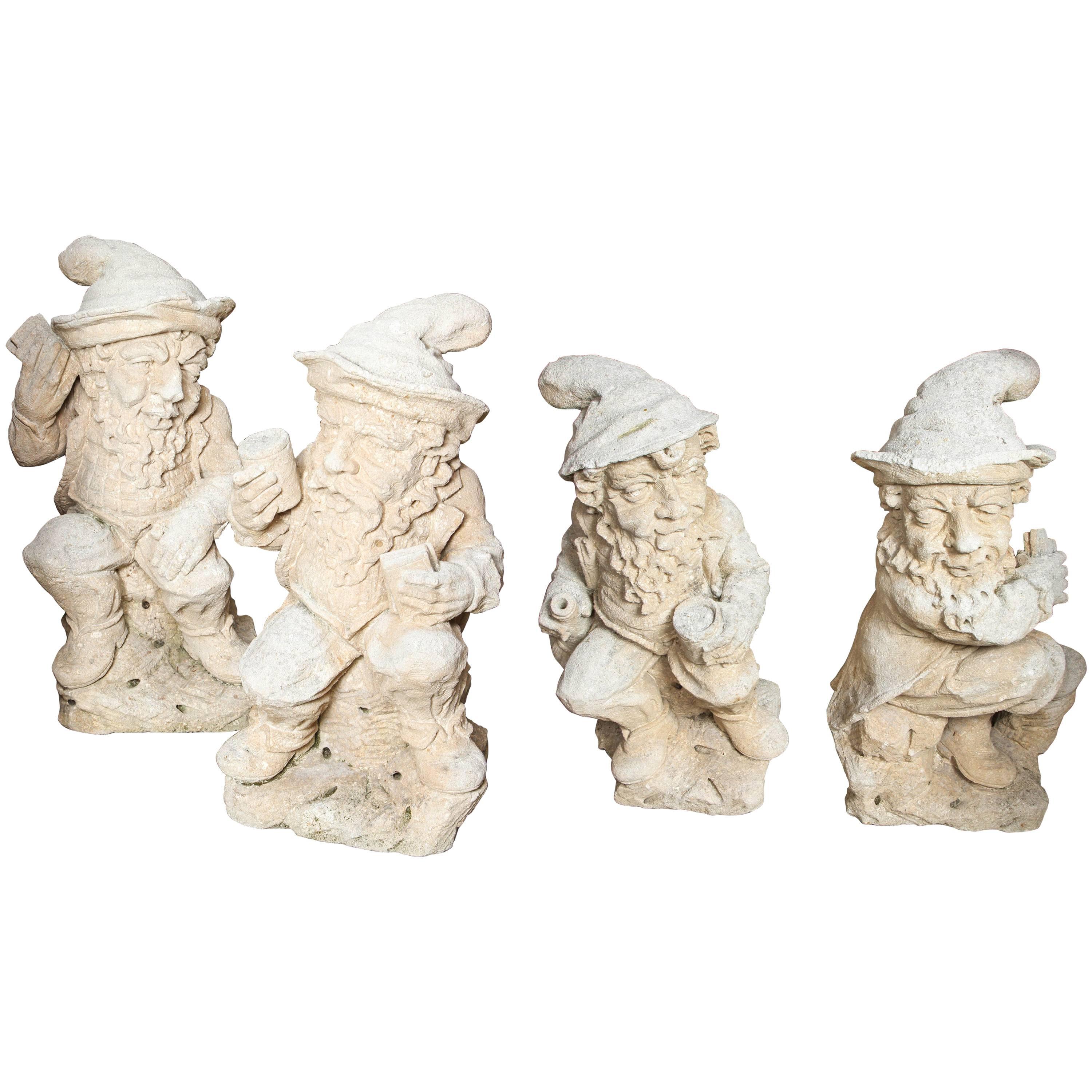 Group of Four French Carved Limestone Gnomes from the Early 1900s