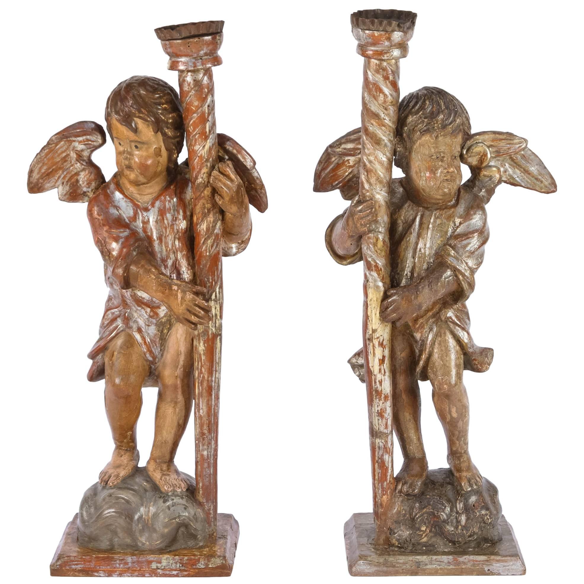 Pair of 18th Century Italian Silver Leaf Cherub Candleholders For Sale