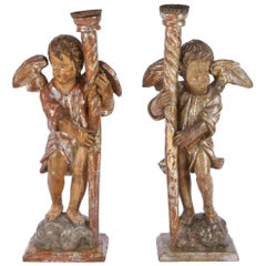 Pair of 18th Century Italian Silver Leaf Cherub Candleholders