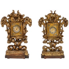 Paire d'horloges et de baromètres italiens du XVIIIe siècle