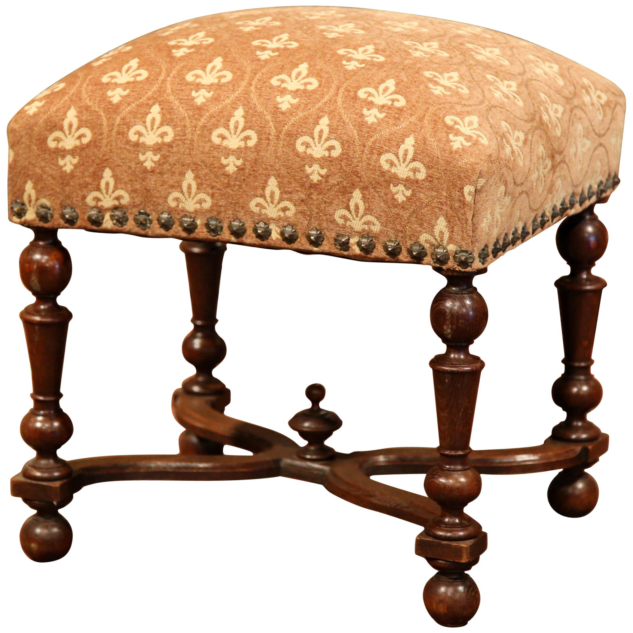 19th Century French Louis III Carved Walnut Stool with Fleur-de-Lys Fabric