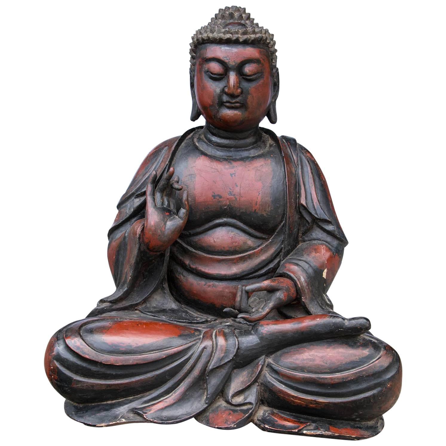 Seated Cross Legged Dark Red and Black Lacquer Asian Buddha For Sale