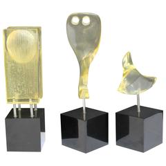 Three Carved Lucite Maquettes