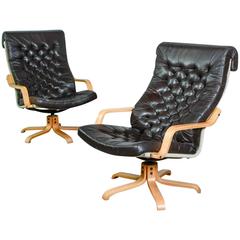Mid-Century Pair of Scandinavian High Quality Leatherette Swivel Relax Chairs