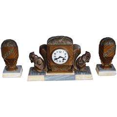 Bronzed Art Deco Clock Set with Stylized Squirrel Sculptures and Onyx Base