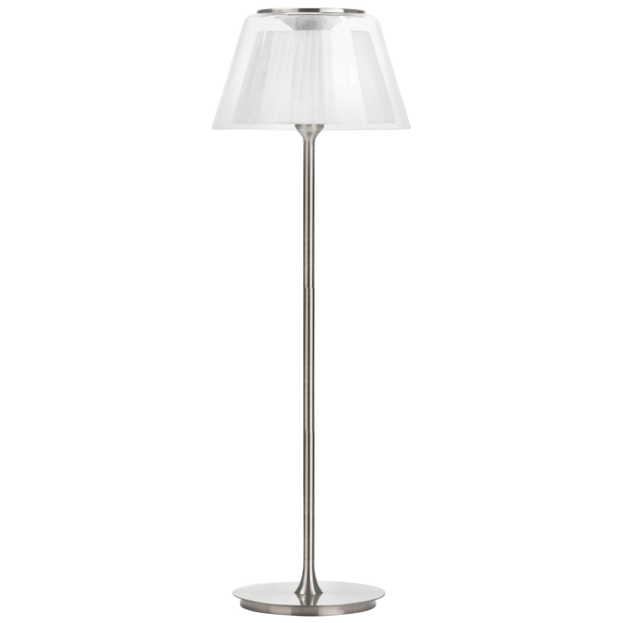 These elegant Gretta 50 floor lamps by Alfonso Fontal for Modiss feature a white fabric shade covered by handblown glass. The bases are brushed aluminium. A great look, and your shades will be preserved for all time. Made in Spain.

They have never