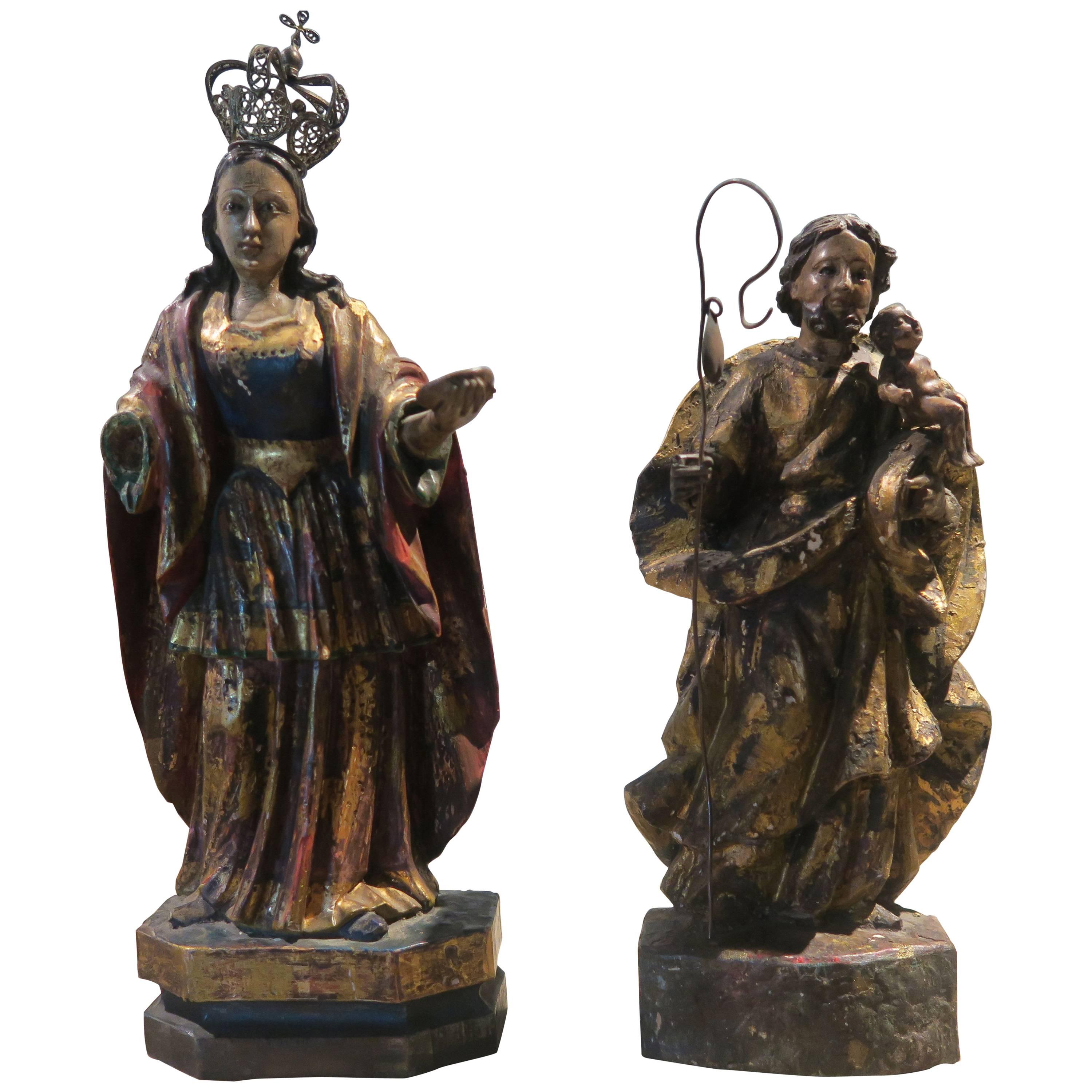 Pair of 17th Century Spanish Gilt and Painted Wood Sculptures For Sale
