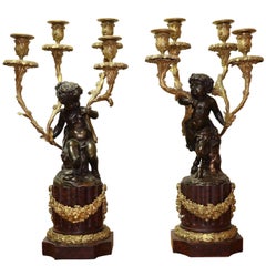 Pair of Louis XVI Gilt Bronze and Patinated Candelabra Attributed to J-L Prieur Antique Pair of Louis XVI Gilt Bronze and Patinated Candelabra Attributed to J-L Prieur