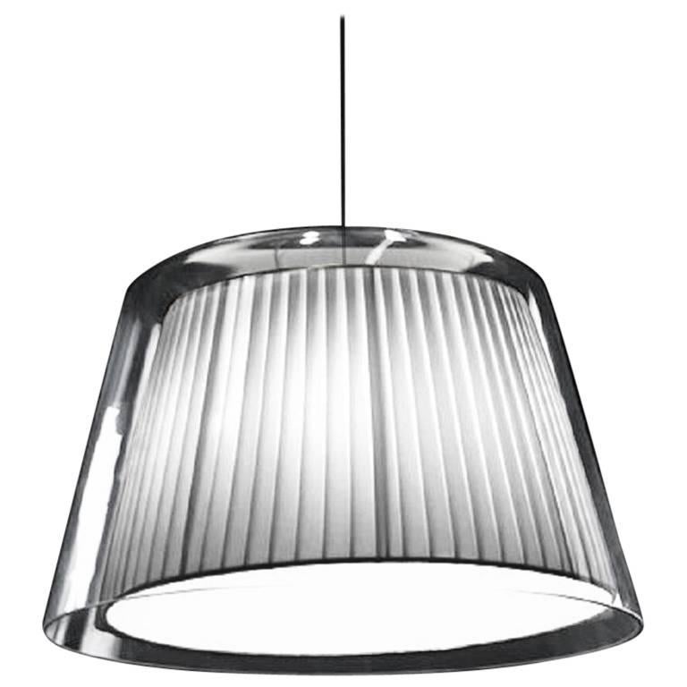 These elegant Gretta 2C30 ‘replacement’ pendants by Alfonso Fontal for Modiss feature a white fabric shade covered by handblown glass. Note that this listing is for the pendant and wire only; the ceiling mount is not included. A great look, and your