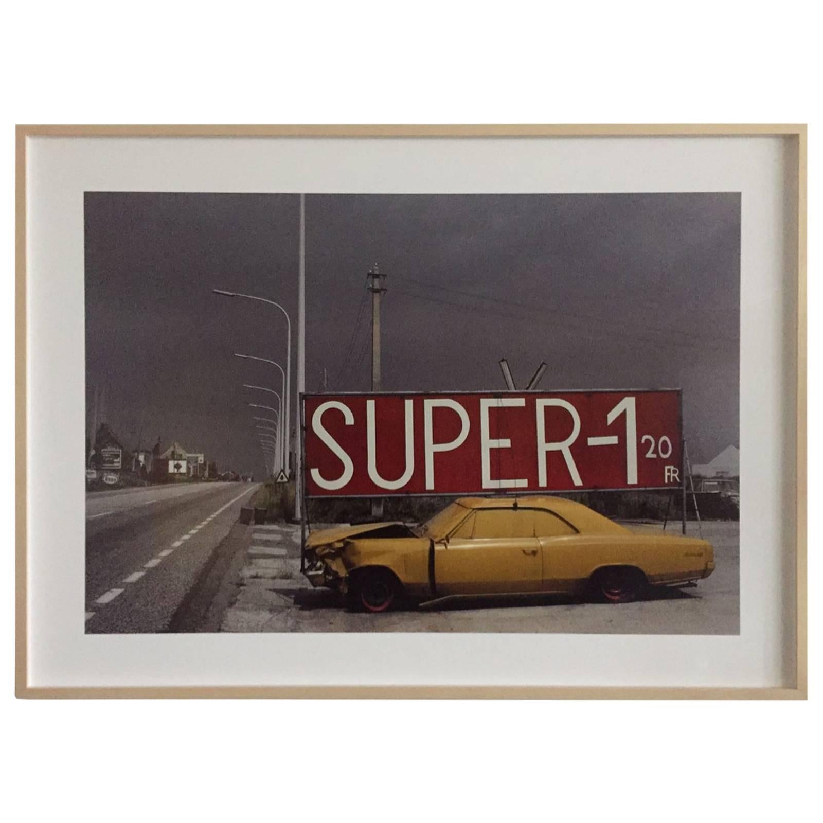 It is a Large Harry Gruyaert fine art print 3 on canson baryta with signed certificate in a wooden frame with anti-reflection, museum glass.

Born in Belgium in 1941, Harry Gruyaert studied photography and film-making. He made a few films as