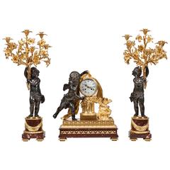 Antique French 19th Century Bronze and Ormolu Clock and Matching Candelabra