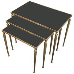 Set of Black Glass and Brass Nesting Tables in the Style of Maison Jansen