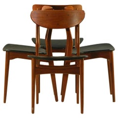 1960s Set of Eight Danish Dining Chairs in teak and Black Leatherette