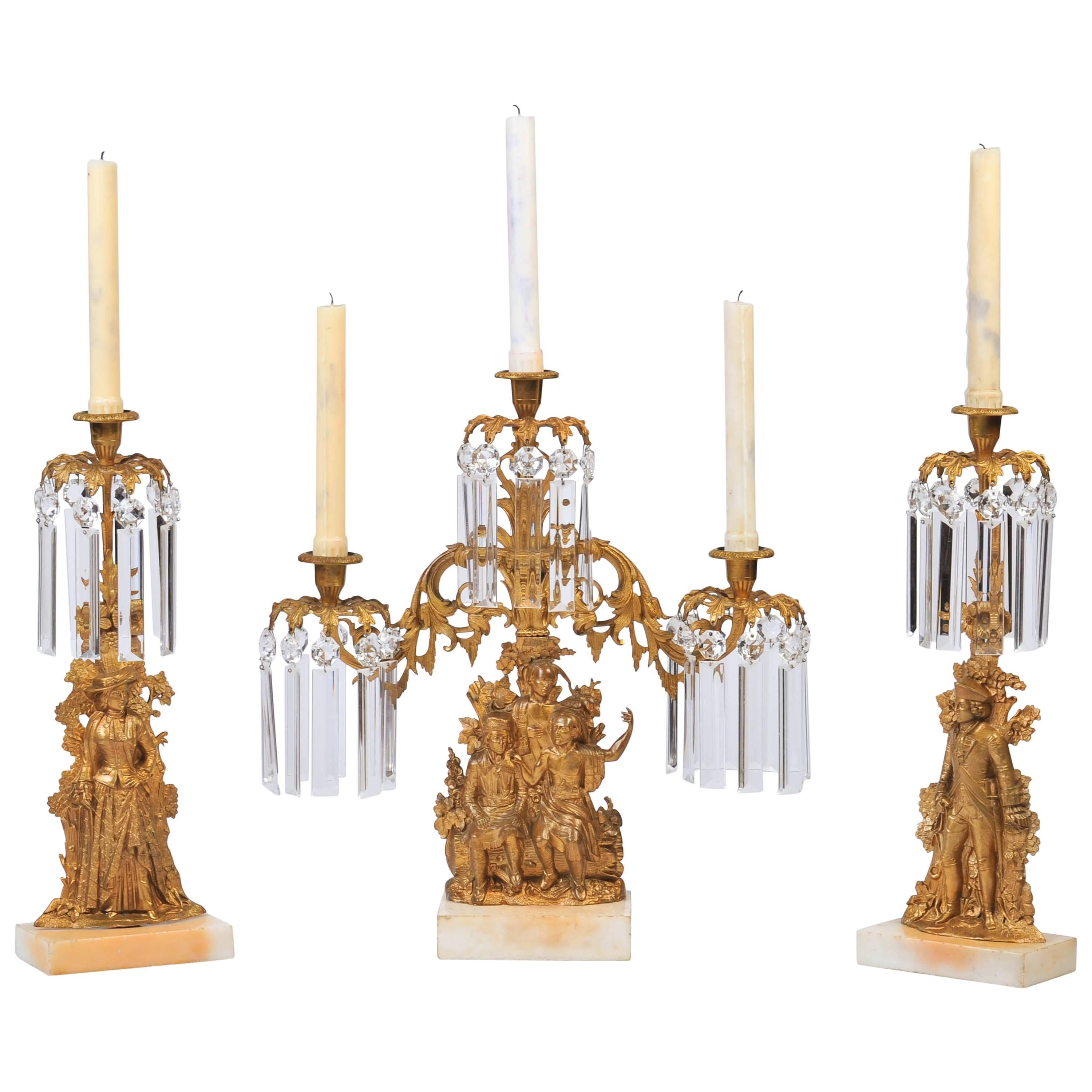 Last of the Mohicans. Set 3 Gilt Brass Figurative Candlesticks by Cornelius & Co