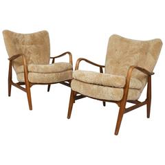 Paire de fauteuils rares avec pouf par Acton Schubell & Ib Madsen