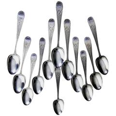 Set of 12 Georgian Silver Teaspoons with Bright-Cut Engraving