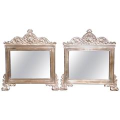 Pair of 19th Century French Silvered Brass Repousse Mirrors with Shell Motif
